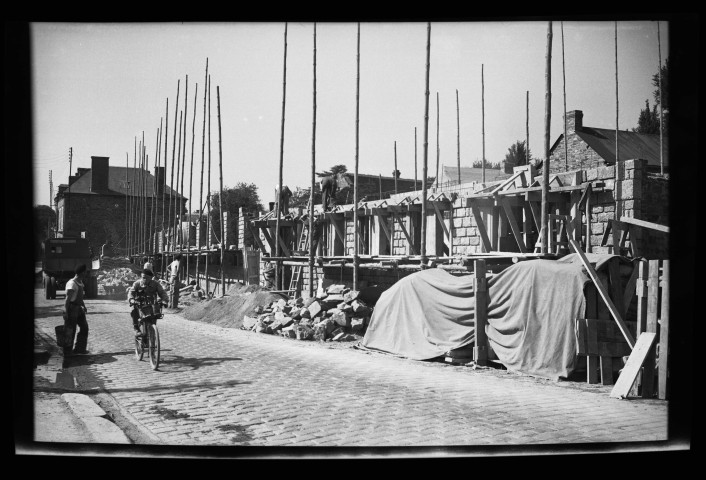 Reconstruction de la rue Saint-Martin à Condé-sur-Noireau (photos n°277 à 302).