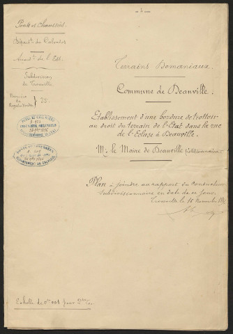 Établissement d'une bordure de trottoir dans la rue de l'Écluse